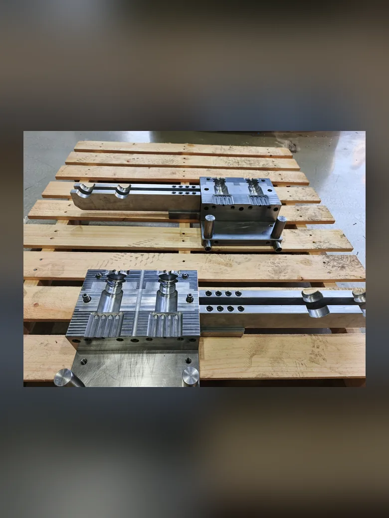 Extrusion blow moulds on a pallet in the tool room